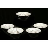 James Arnold Martin, a set of five studio pottery metallic lustre and sgraffito candle holders (5).