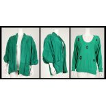 GIANNI VERSACE JACKET, 1980s, emerald green suede,