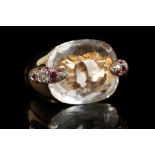 An 18ct gold and faceted rock crystal cocktail ring by Pomellato, with pave set ruby and diamond