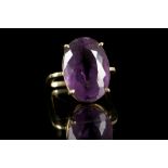 A c.1970's 18ct gold and amethyst dress ring. Size: L.