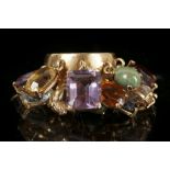 A high carat gold and multi-gem dress ring, tassel set with amethyst, aquamarine, citrine, turquoise