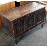 An oak, 18th / 19th century coffer, rib top, candle box, later strap wings, foliate carved with 3