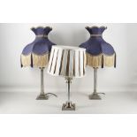 A pair of contemporary Corinthian column table lamps on stepped square bases, approx 29cm high and a