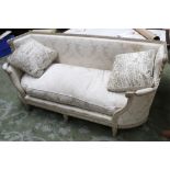 A French 19th century Louis XVI style sofa, carved and painted with curved ends, ribbon twist and