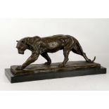 After Bugatti, an animalier bronze of a lioness, supported on a marble base, bears Talos Gallery