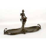 Patinated bronze sweetmeat twin dish of Art Nouveau form, a maiden with bird upon her arm seated