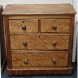 A satin walnut chest of two short over two long drawers, raised on bun feet, 91 x 90 x 48cm