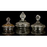 THREE GERMAN ENGRAVED COVERS FOR ENGRAVED GOBLETS, early or mid 18th century, each decorated with