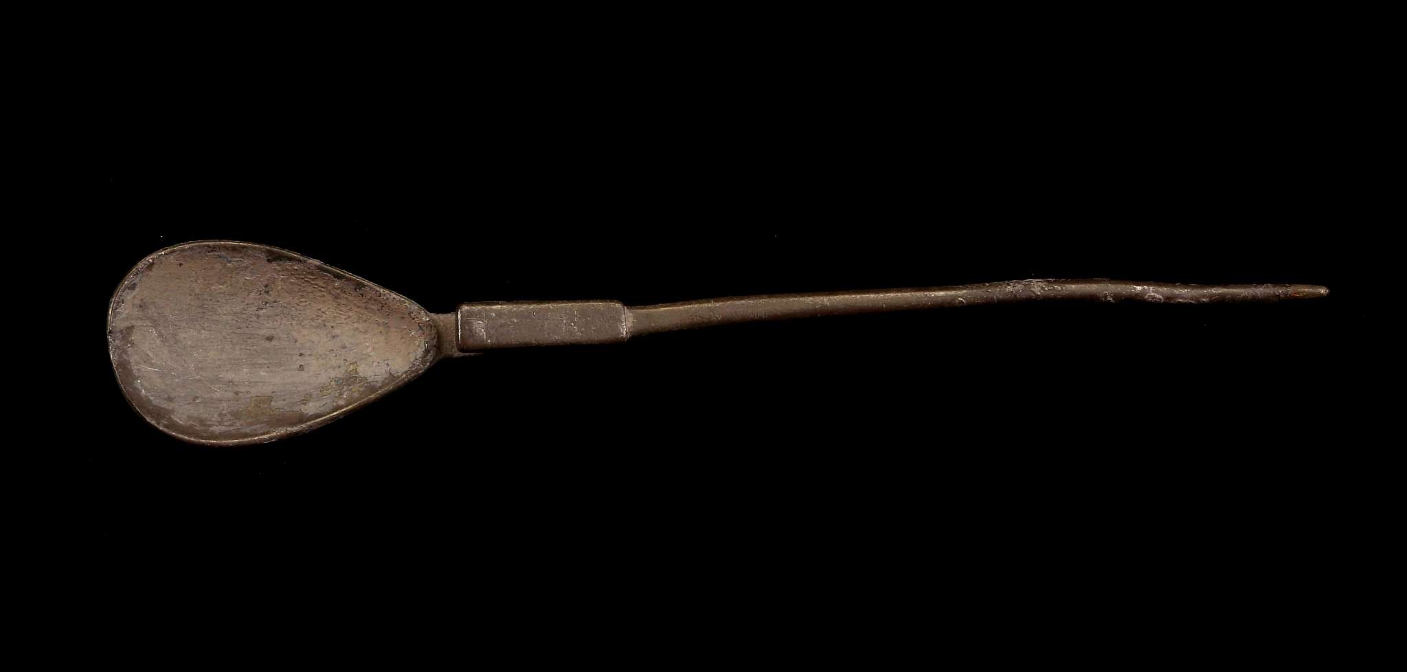 A ROMAN SILVER SPOON Circa 4th Century A.D. With pear-shaped bowl and tapering straight handle, 15.