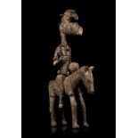 A SENUFO ‘SYONFOLO’ EQUESTRIAN FIGURE, IVORY COAST The rider with elongated neck and cylindrical