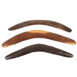 THREE ABORIGINAL BOOMERANGS, AUSTRALIA One carved with two kangaroos, another decorated with incised