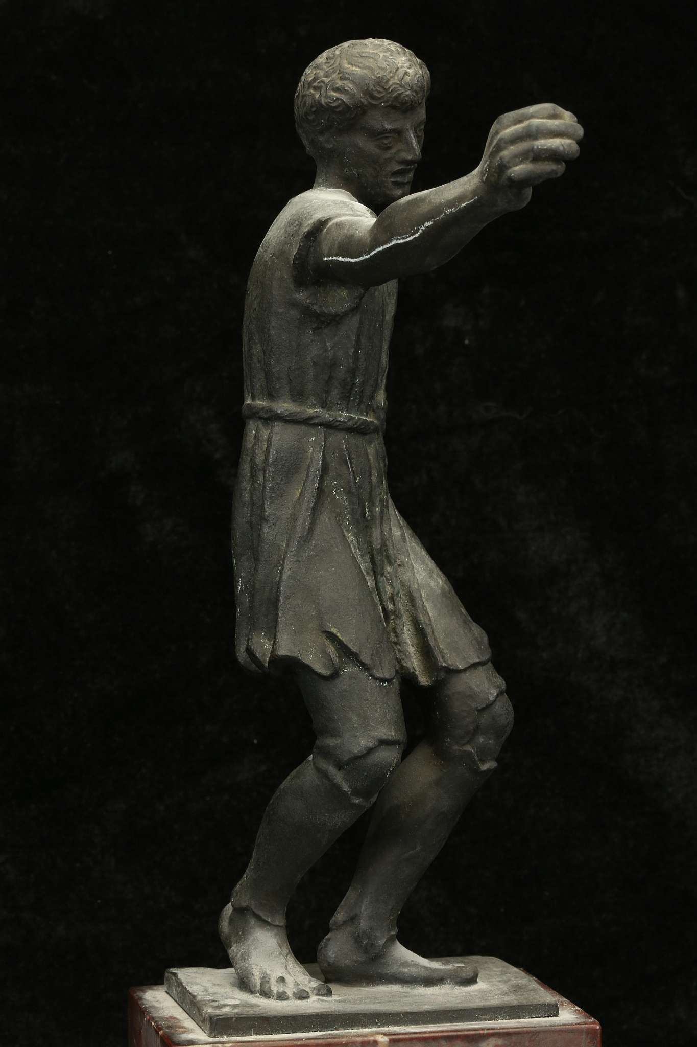 A GERMAN OR ITALIAN PATINATED BRONZE FIGURE OF A ROMAN SLAVE Circa 19th Century A.D. Provenance: - Image 2 of 2