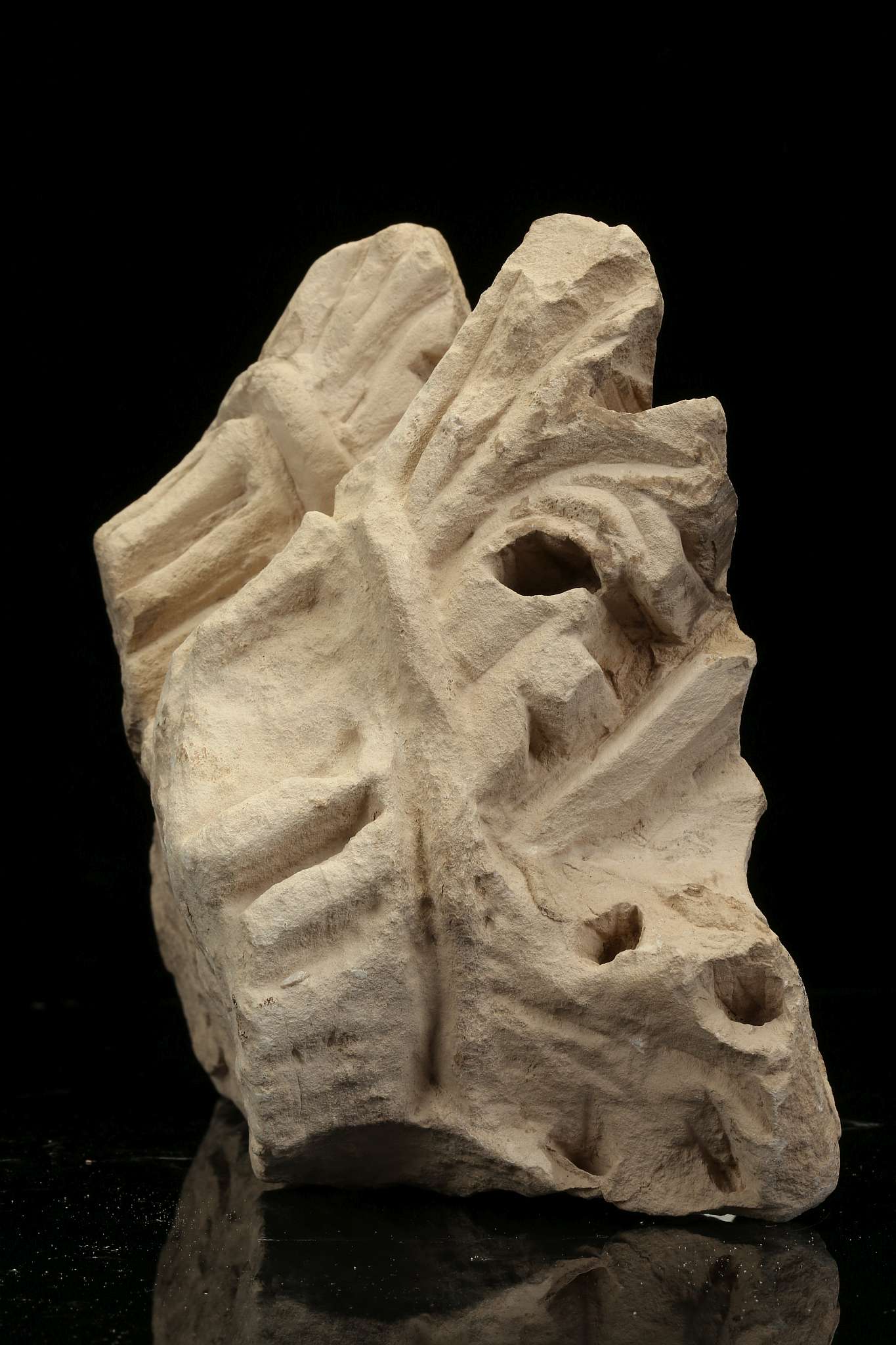 TWO ROMAN STONE FRAGMENTS Circa 2nd-3rd Century A.D. Including a limestone capital fragment, - Image 2 of 3