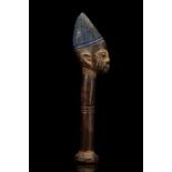 A YORUBA DANCE STAFF 'OSHE SHANGO', NIGERIA The terminal carved in the shape of a human head, the