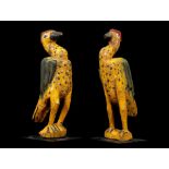 TWO BOZO HORNBILL BIRD PUPPETS, MALI Standing upright with folded black and green wings, the