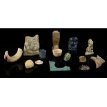 FOURTEEN EGYPTIAN GLASS AND GLAZED COMPOSITION FRAGMENTS New Kingdom to Roman Period, circa 16th