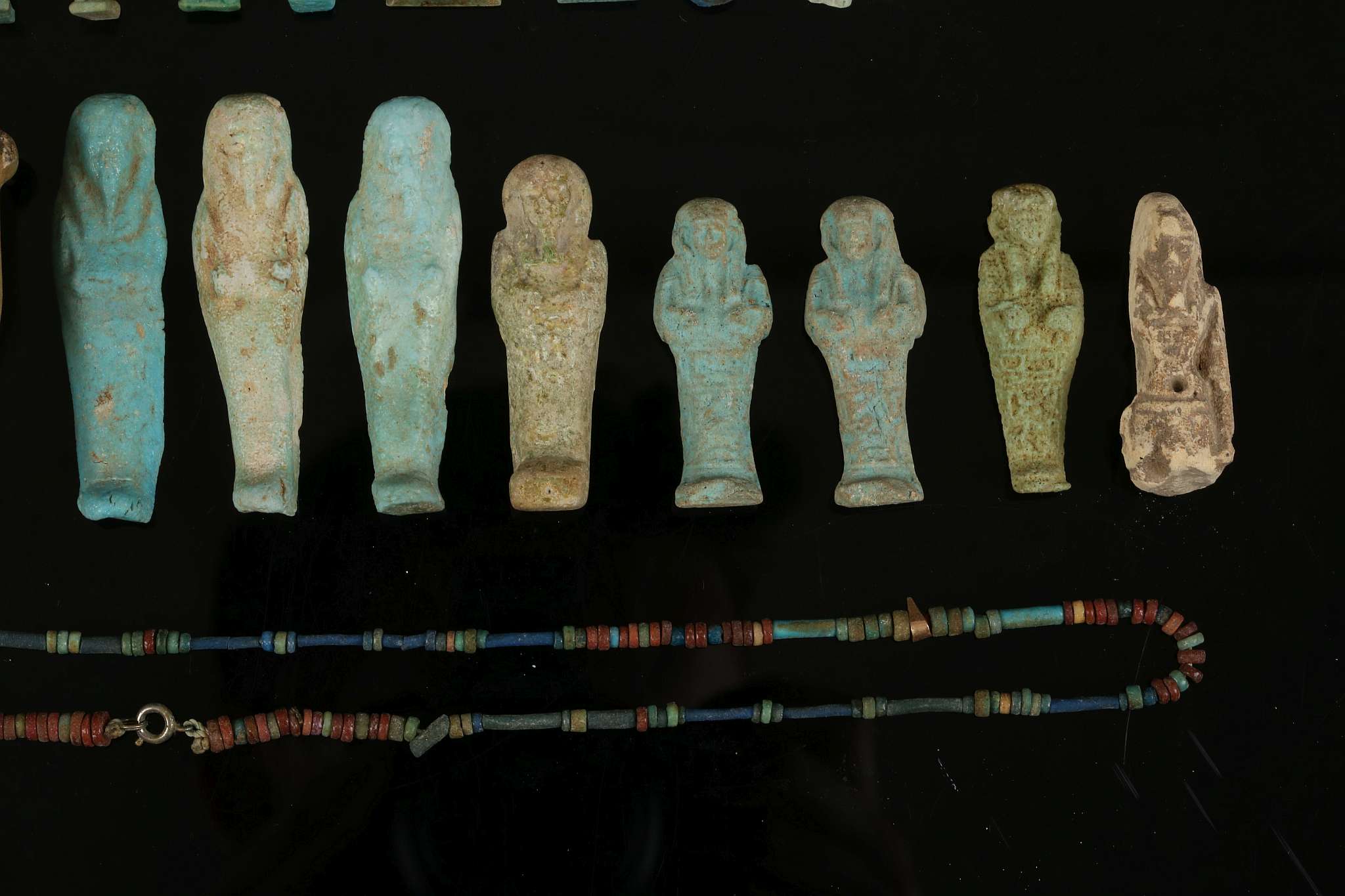 A GROUP OF EGYPTIAN GLAZED COMPOSITION AMULETS AND SHABTIS New Kingdom to Late Period, circa 1550- - Image 4 of 4