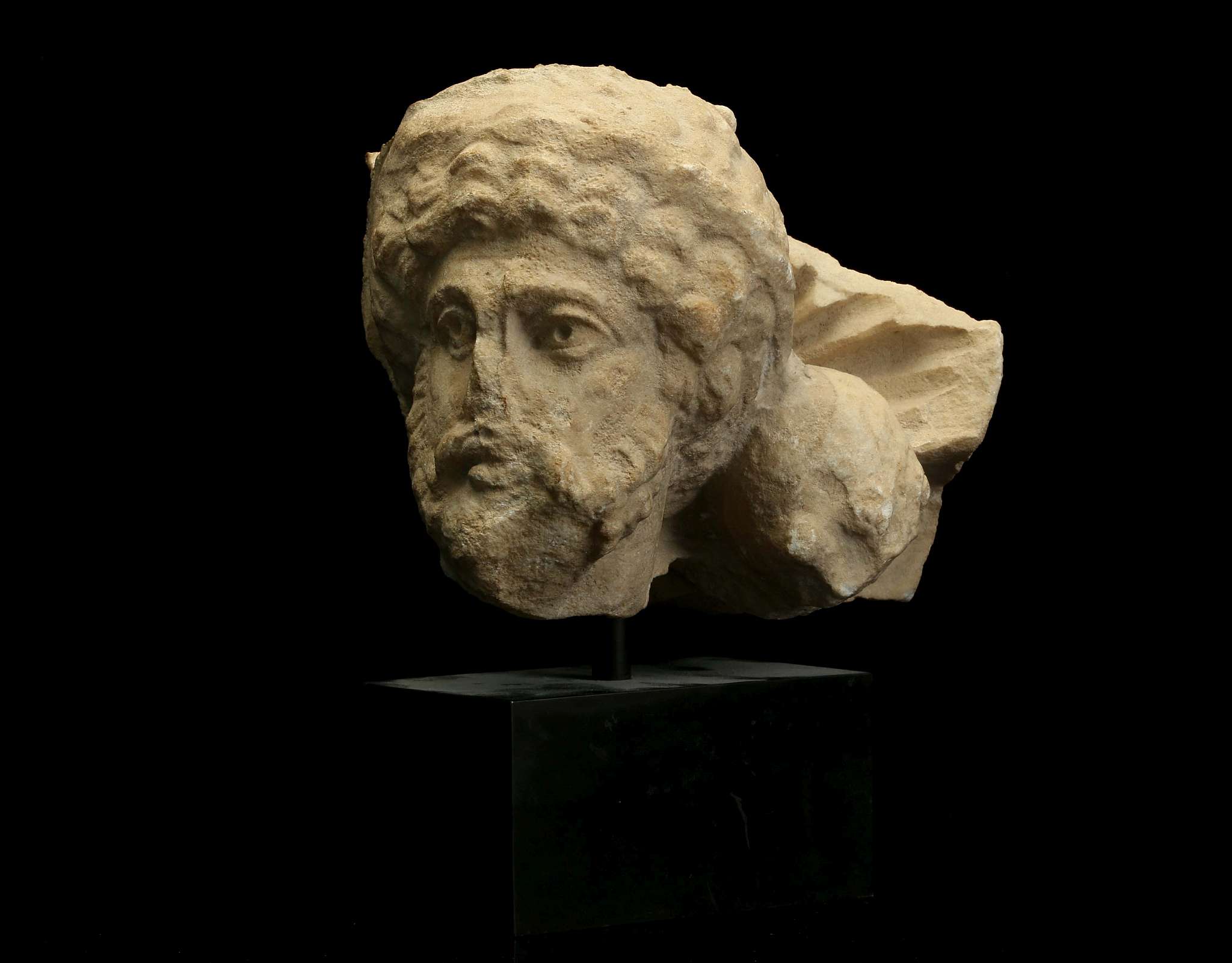 A ROMAN MARBLE SARCOPHAGUS FRAGMENT Circa early 3rd Century A.D. Depicting a male head with full - Image 2 of 3