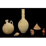 A GROUP OF TERRACOTTA ITEMS Including an Islamic vessel with long neck and floral design, 46cm high;