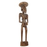 A LARGE SENUFO FIGURE OF MOTHER AND CHILD, IVORY COAST The mother depicted pregnant, carrying an