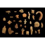 TWENTY-NINE ANCIENT TERRACOTTA FRAGMENTS Neolithic Period to Roman Period, circa 3rd Millennium B.C.