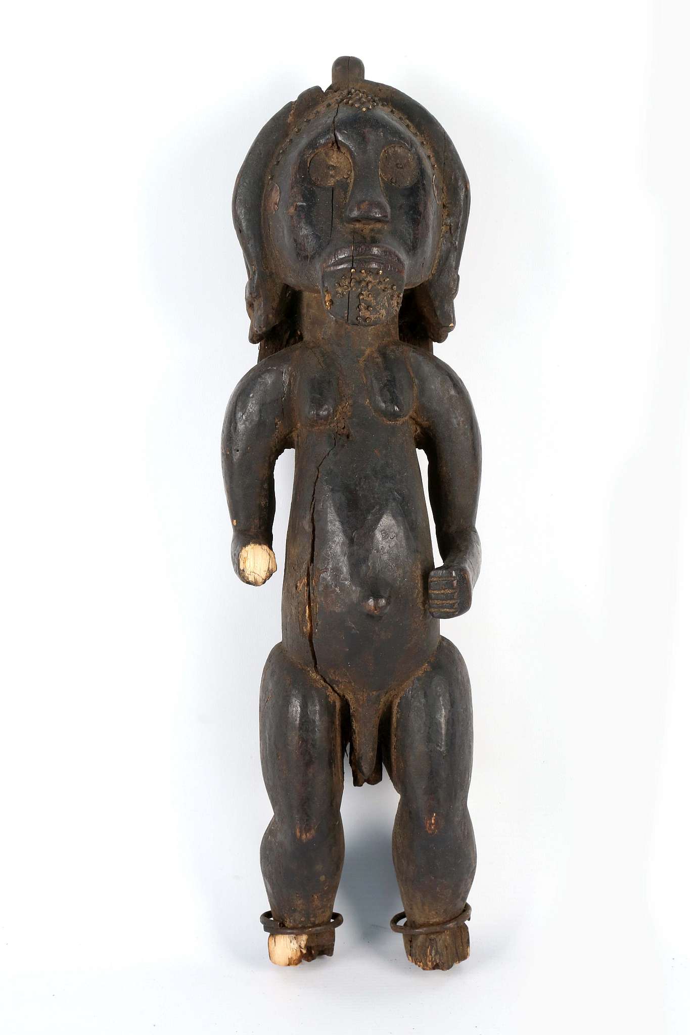 A FANG STANDING MALE FIGURE, GABON With brass disc insets for the eyes, beard and long hair in