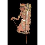 A 'WAYANG KULIT' SHADOW PUPPET, INDONESIA Probably from Bali, depicting an old female character,