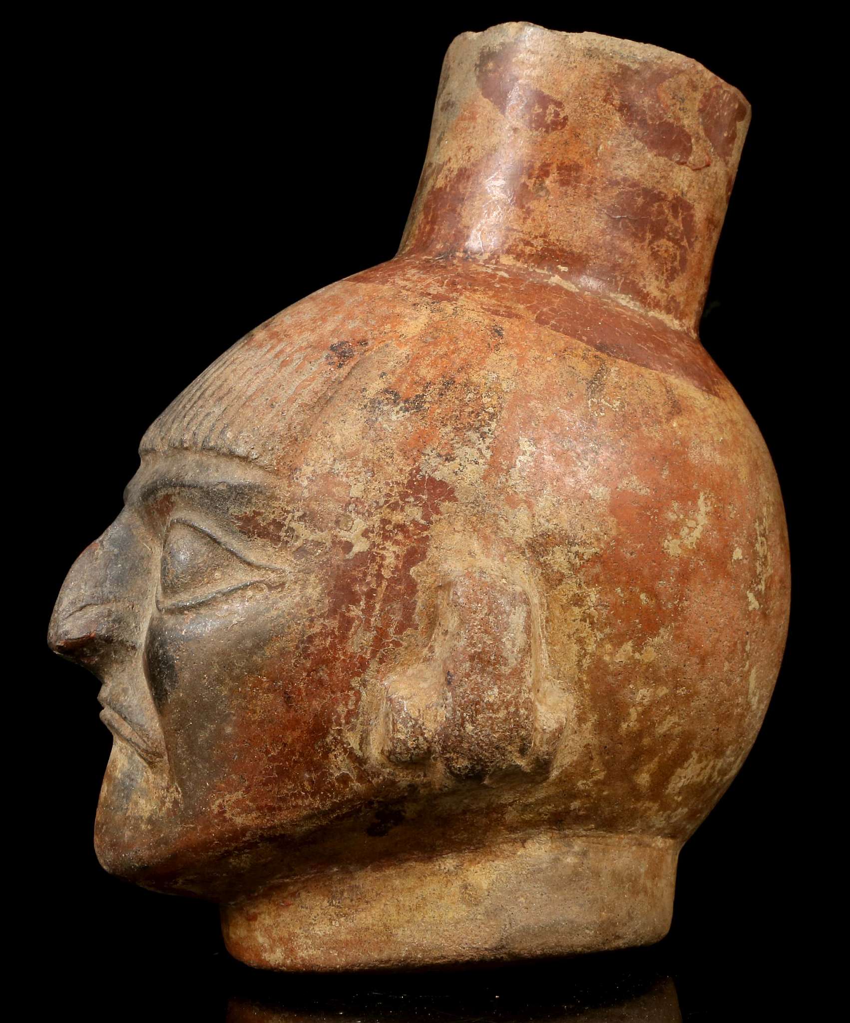 A MOCHE HEAD VESSEL, PERU Depicting the head of a man, possibly a priest, with a short fringe over - Image 3 of 5
