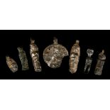 SEVEN ROMANO-EGYPTIAN AND COPTIC SILVER AND BRONZE AMULETS Circa 1st-6th Century A.D. Including a