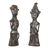 A PAIR OF YORUBA BRONZE 'ONILE' STAVES OF THE OGBONI SOCIETY, NIGERIA  Both sitting on a bell-shaped