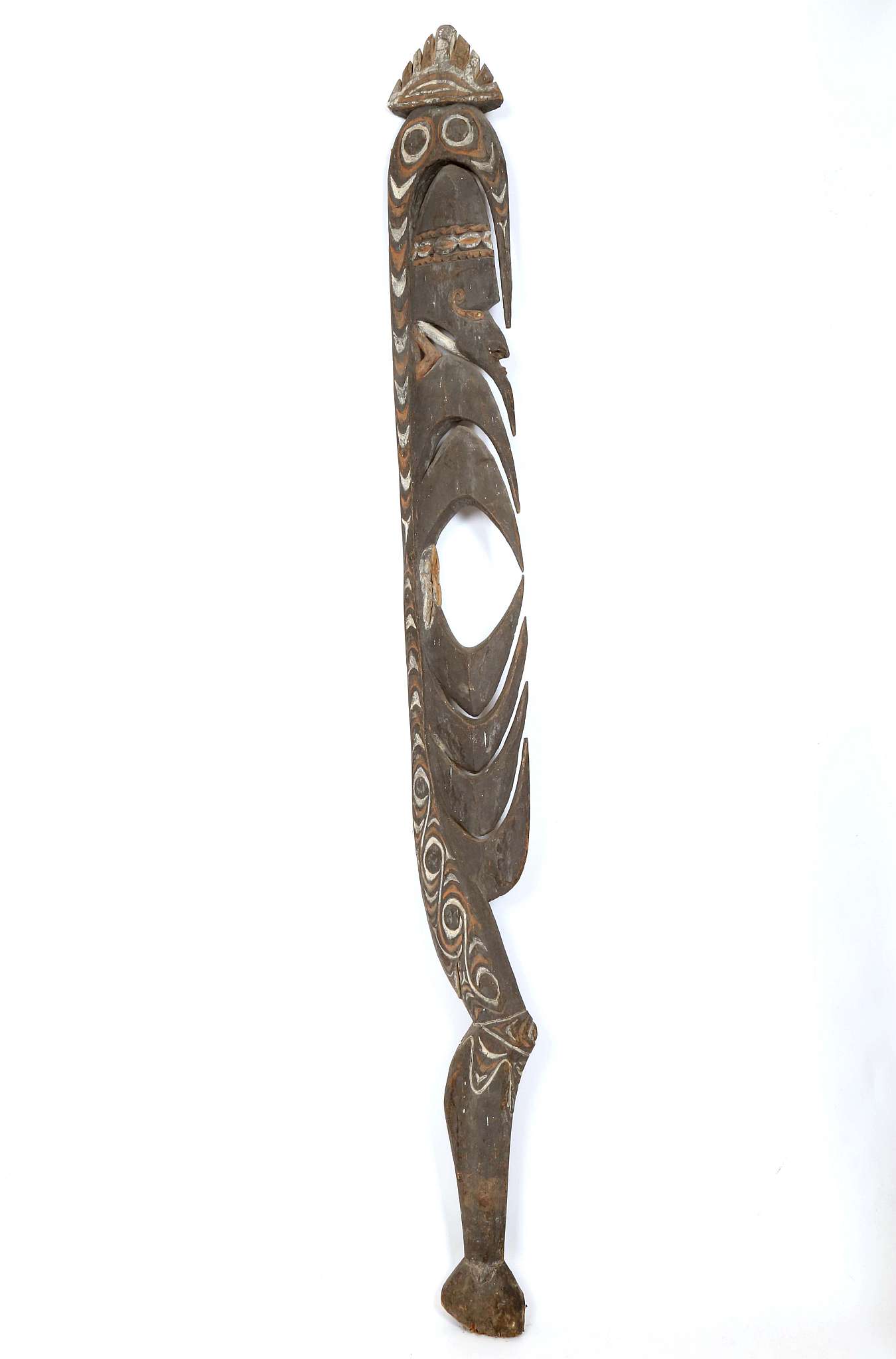 A KOREWORI 'YIPWON' HOOK FIGURE, PAPUA NEW GUINEA Carved from a single piece of wood, with typical