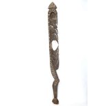 A KOREWORI 'YIPWON' HOOK FIGURE, PAPUA NEW GUINEA Carved from a single piece of wood, with typical