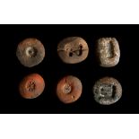 SIX EGYPTIAN TERRACOTTA MOULDS New Kingdom to Late Period, circa 1550-332 B.C. Three examples for