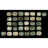 THIRTY-TWO EGYPTIAN GREEN GLAZED COMPOSITION BEADS Late Period to Ptolemaic Period, circa 664-30 B.