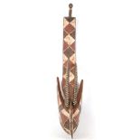 A MOSSI ANTELOPE MASK, BURKINA FASO The abstract antelope head with long curved horns, surmounted by