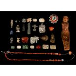 A GROUP OF EGYPTIAN HARDSTONE AND BRONZE AMULETS AND FRAGMENTS Second Intermediate Period to
