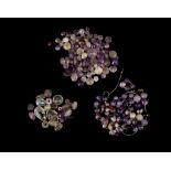 A GROUP OF ROMAN AMETHYST, ROCK CRYSTAL AND GARNET BEADS Circa 1st-3rd Century A.D. Of spherical,