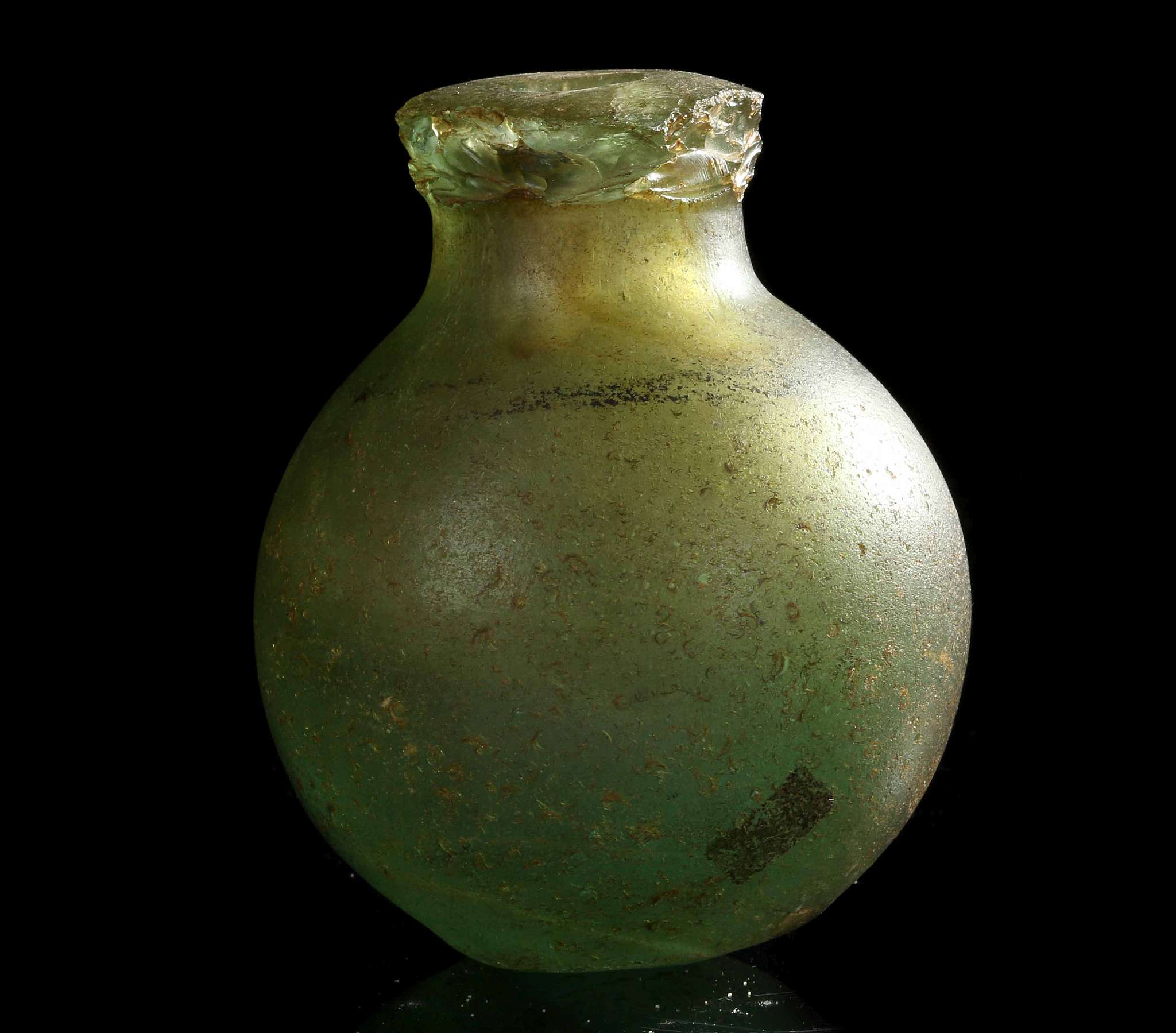 A EUROPEAN GREEN GLASS 'GREEK FIRE' HAND GRENADE Circa 16th-18th Century A.D. With thick-walled - Image 2 of 2