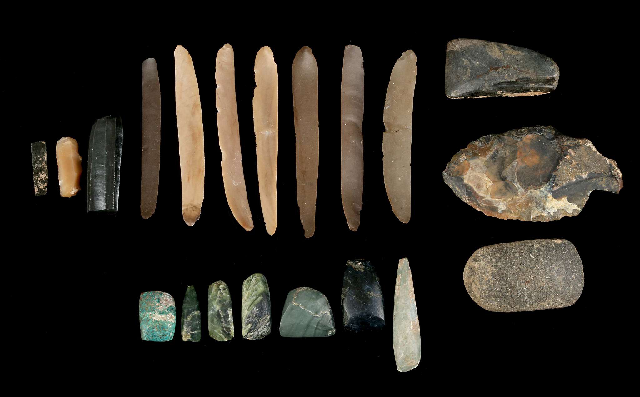 TWENTY EGYPTIAN STONE IMPLEMENTS Circa 4th Millennium B.C. Including nine flint blades, a flint