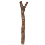 A DOGON LADDER, MALI Of typical stepped, Y-shaped form, with shiny brown patina, 163cm high