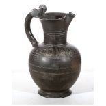 AN ETRUSCAN BUCCHERO WARE OINOCHOE Circa 6th Century B.C. With trefoil lip, slightly squat round