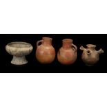 FOUR AFRICAN CLAY VESSELS, WEST AFRICA Including a Nigerian example with flaring mouth and four