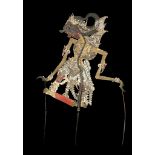A 'WAYANG KULIT' SHADOW PUPPET, INDONESIA From Central Java, the leather body painted and