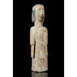 AN EWE FEMALE ANCESTOR STANDING FIGURE, MALI Wearing a long tunic, the long black hair tied with a