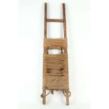A JAPANESE 'SHOIKO' BACK CARRIER Showa era (1912-1989) Made of wood, rope and recycled fabric strips