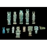 THIRTEEN EGYPTIAN GREEN GLAZED COMPOSITION AMULETS Late Period, circa 664-332 B.C. Including four