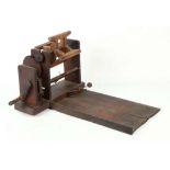 A JAPANESE SPOOL WINDER Showa era (1912-1989) With arm and cogs spinning the 'itomaki' thread spool,