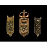 THREE BYZANTINE BRONZE BUCKLES Circa 6th-8th Century A.D. Including a complete example with loop,