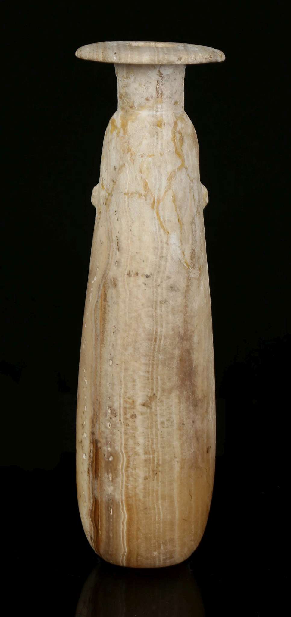 A GREEK ALABASTER ALABASTRON Circa 6th Century B.C. The elongated body tapering to the neck, with - Image 2 of 2