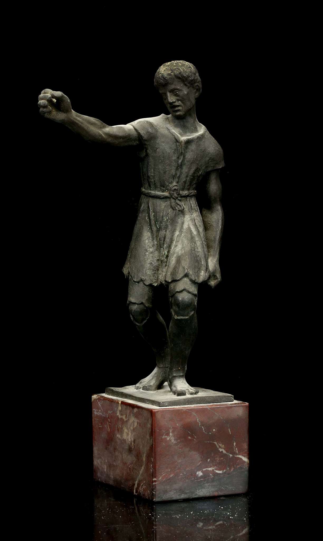 A GERMAN OR ITALIAN PATINATED BRONZE FIGURE OF A ROMAN SLAVE Circa 19th Century A.D. Provenance: